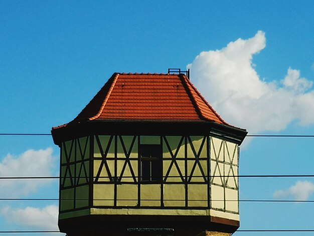 Low angle view of building against blue sky