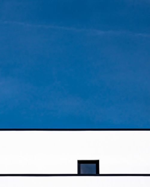 low angle view of building against blue sky