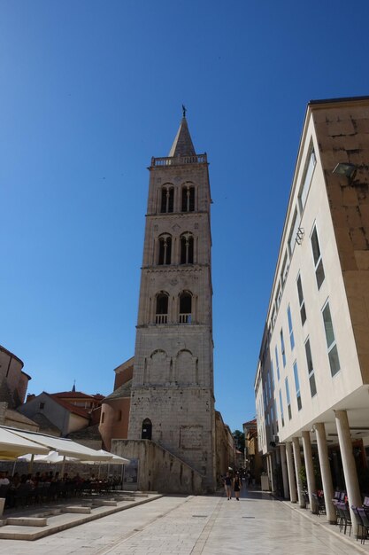 Low angle view of building against clear blue sky