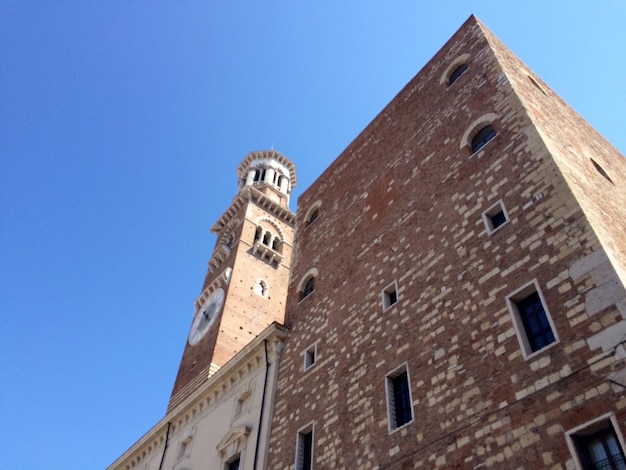 Low angle view of building against clear blue sky