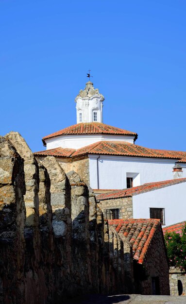 Low angle view of building against clear blue sky