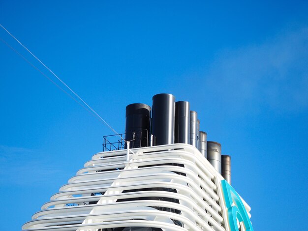 Low angle view of building against clear blue sky