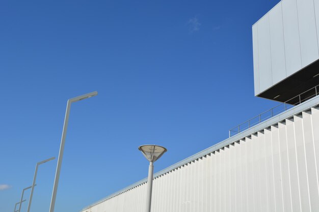 Low angle view of building against clear blue sky