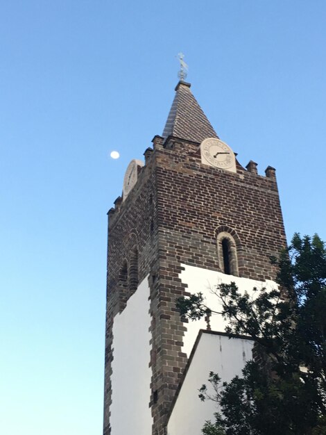 low angle view of building against clear blue sky