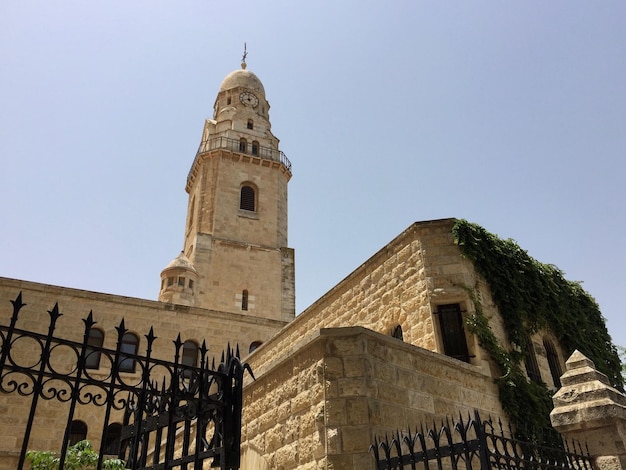 Photo low angle view of a building against sky abbey of the dormition
