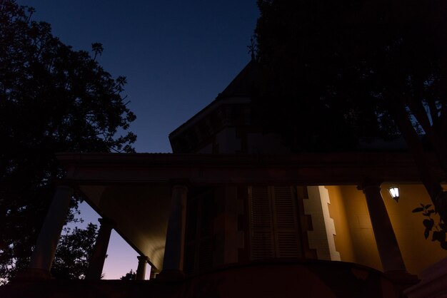 Low angle view of building against sky at night