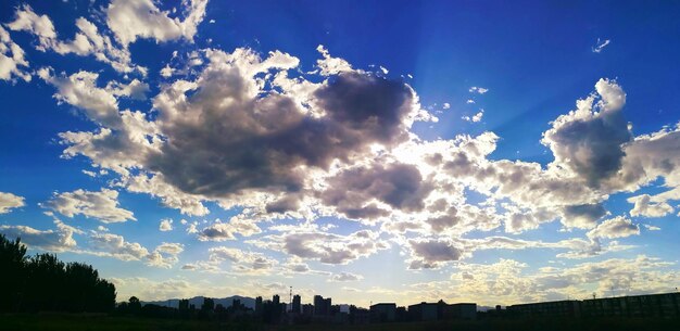 Low angle view of buildings against blue sky