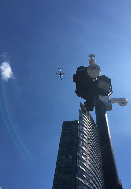 Low angle view of buildings against blue sky