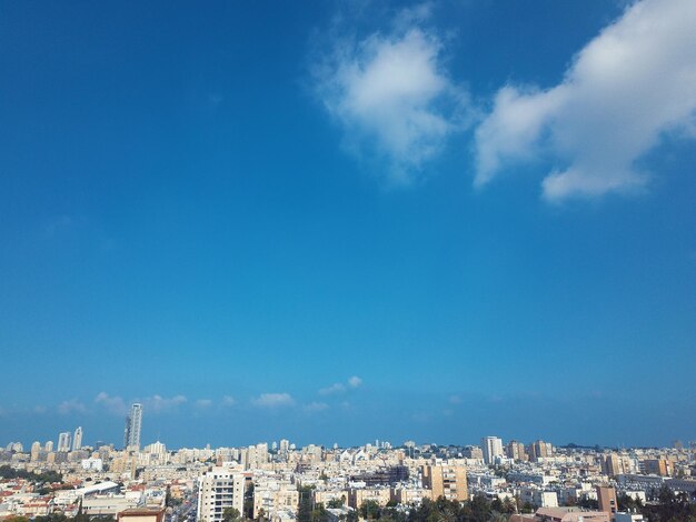 Low angle view of buildings against blue sky