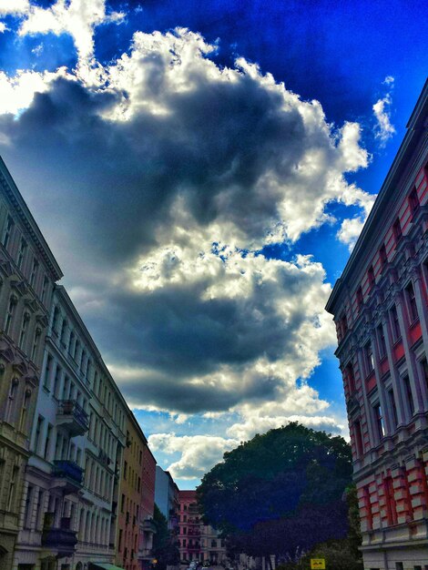 Low angle view of buildings against blue sky