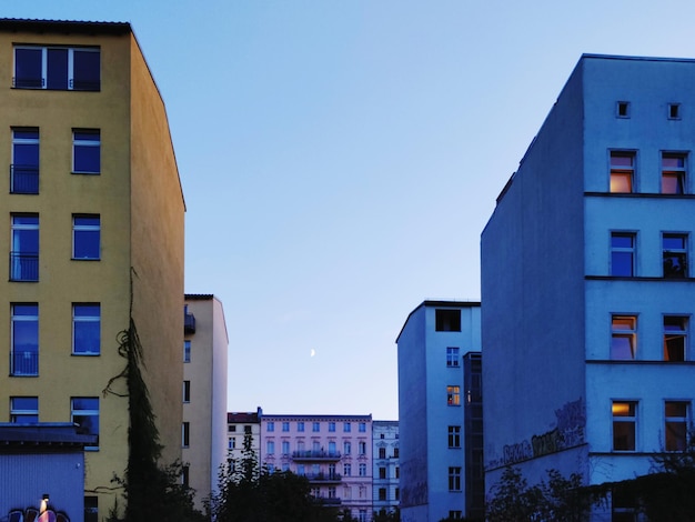 Low angle view of buildings against clear sky