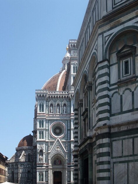 Low angle view of buildings against clear sky