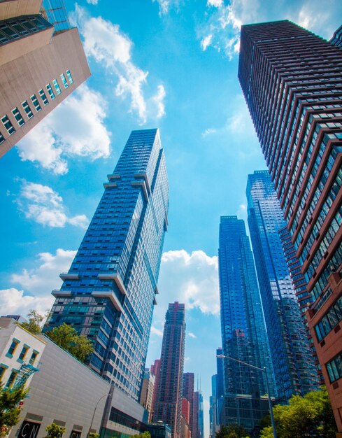 Low angle view of buildings against sky in city