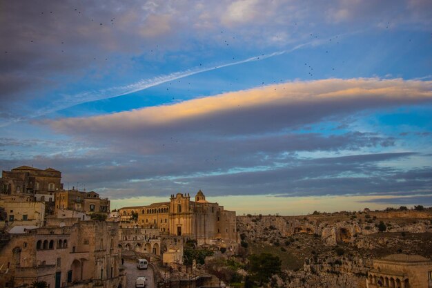 Low angle view of buildings in city against sky