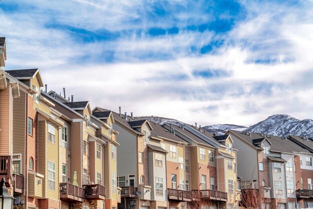 Low angle view of buildings in town against sky