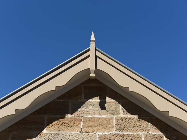 Low angle view of built structure against blue sky