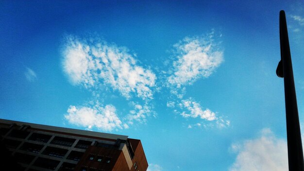 Low angle view of built structure against blue sky