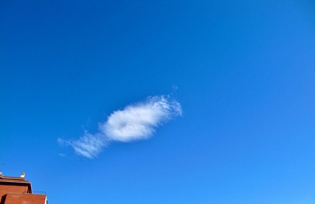 Low angle view of built structure against blue sky