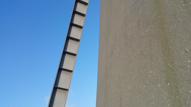 Low angle view of built structure against blue sky