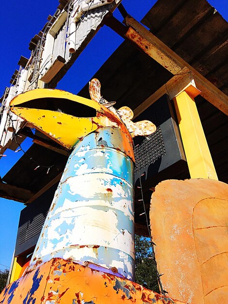 Low angle view of built structure against blue sky