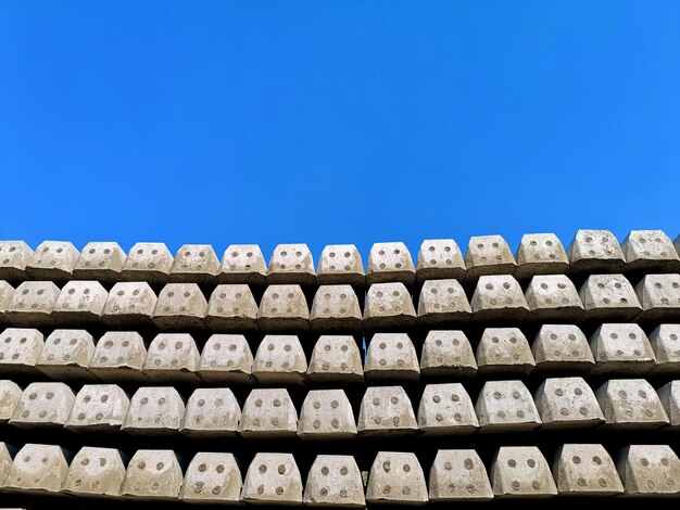 Low angle view of built structure against clear blue sky