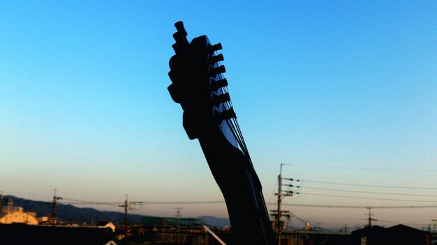 Low angle view of built structure against clear blue sky