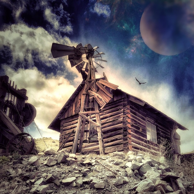 low angle view of built structure against cloudy sky
