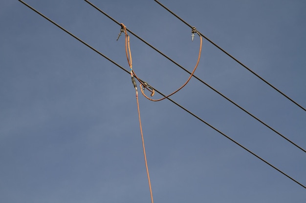 Photo low angle view of cables against clear sky