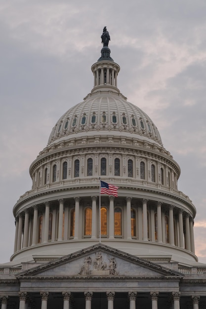 low angle view of capitol building against cloudy sky