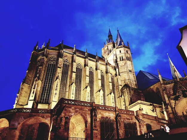 Low angle view of cathedral against blue sky