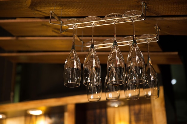 low angle view of champagne flute hanging at bar