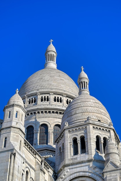 Low angle view of church against blue sky