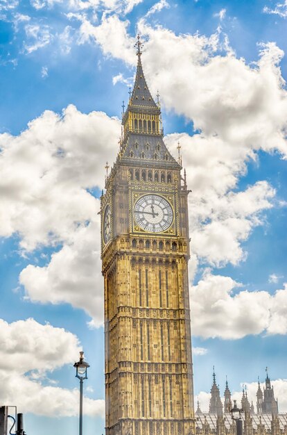 Low angle view of clock tower against sky