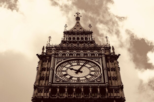 Low angle view of clock tower against sky