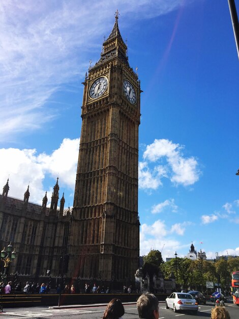 Low angle view of clock tower against sky