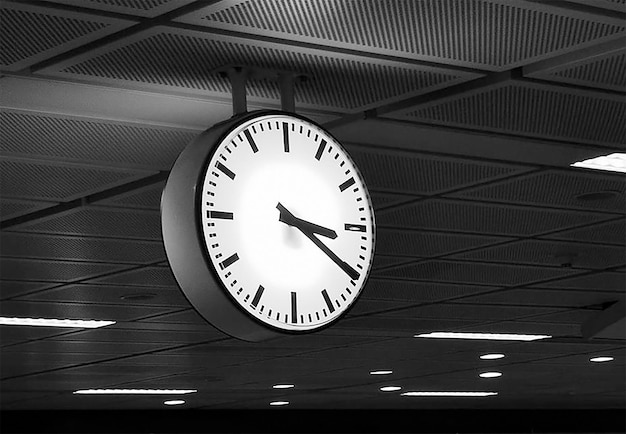 low angle view of clock on wall at railroad station
