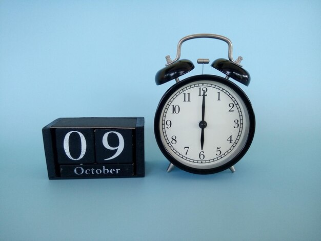 Low angle view of clock on wall