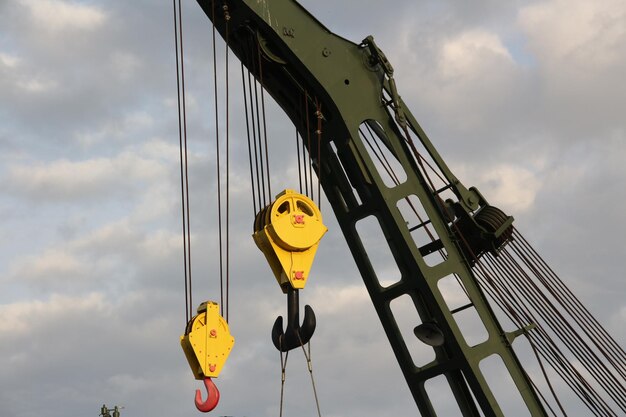 Low angle view of clothes hanging against sky