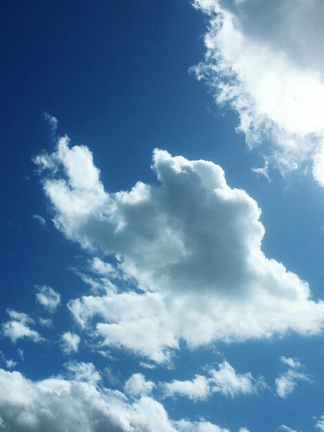 Low angle view of clouds in blue sky