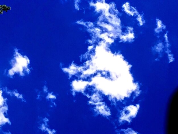 Low angle view of clouds in blue sky