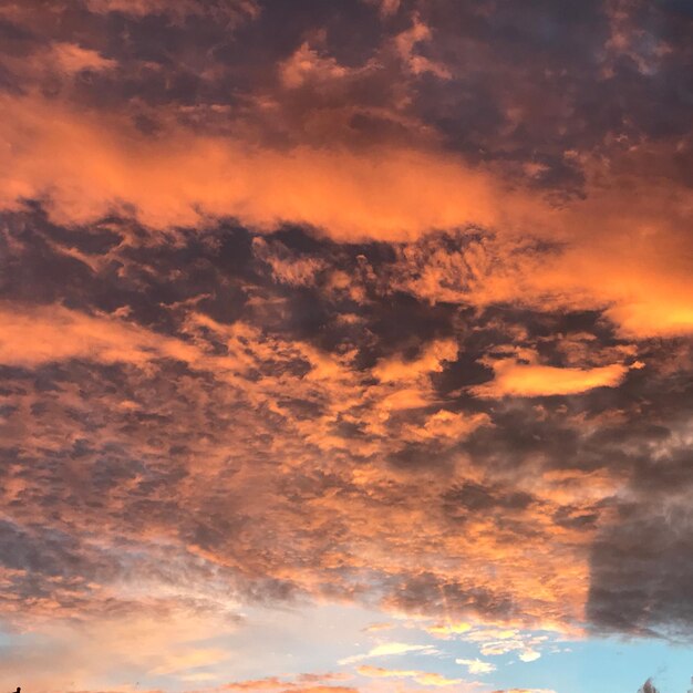 Low angle view of clouds in sky during sunset