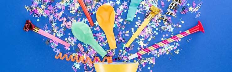फोटो low angle view of colorful balloons against blue background
