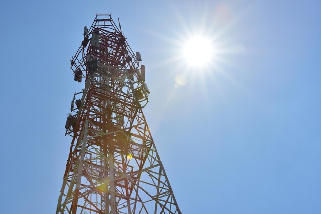 Low angle view of communications tower against sky