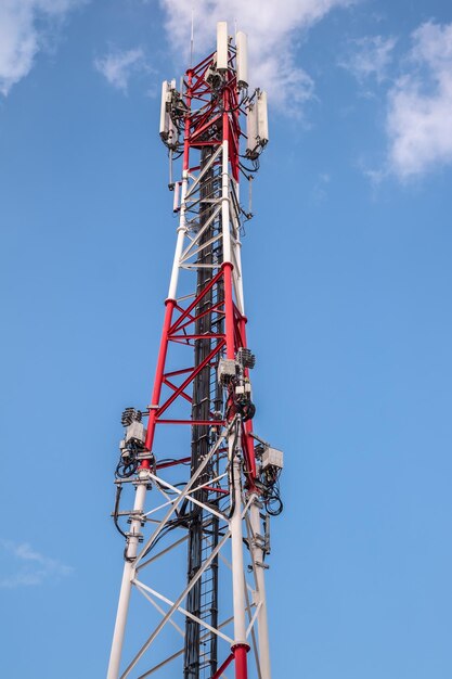 Low angle view of communications tower against sky