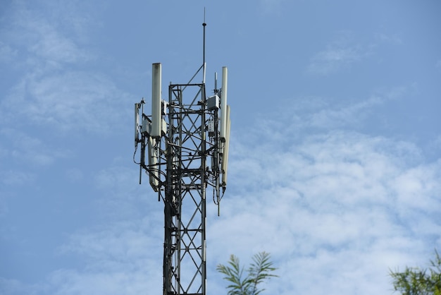 Low angle view of communications tower against sky