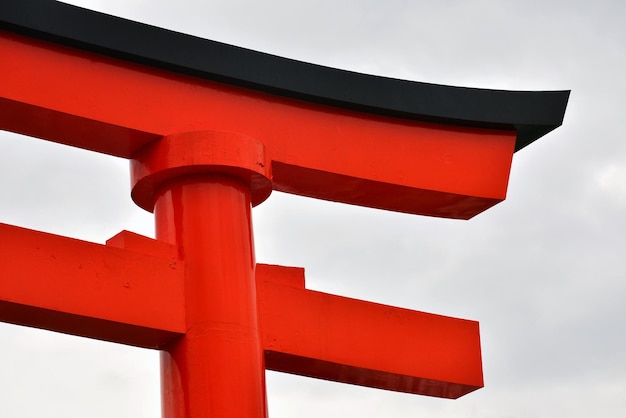 Low angle view of cross against sky