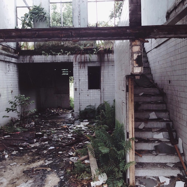 Low angle view of damaged building interior