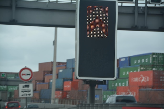 Photo low angle view of digital road sign at commercial dock