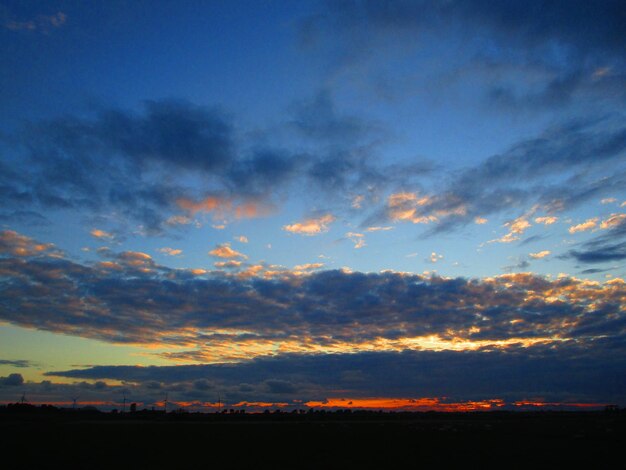 Low angle view of dramatic sky during sunset