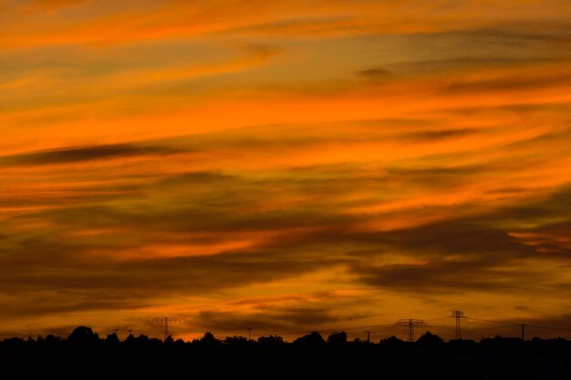 Low angle view of dramatic sky during sunset